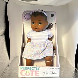 New in the box doll. Perfectly cute my sweet baby. 14 inches tall pacifier